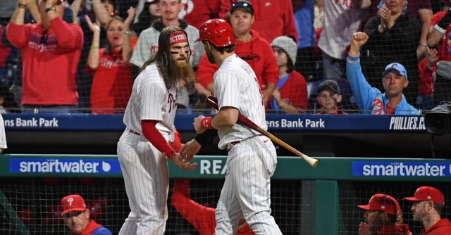 May 9, 2023; Philadelphia, Pennsylvania, USA; Philadelphia Phillies center fielder Brandon Marsh (16) celebrates with designated hitter Bryce Harper (3) after scoring a run against the Toronto Blue Jays during the fifth inning at Citizens Bank Park. Mandatory Credit: Eric Hartline-USA TODAY Sports