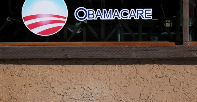 A sign on an insurance store advertises Obamacare in San Ysidro, San Diego, California, U.S., October 26, 2017. REUTERS/Mike Blake