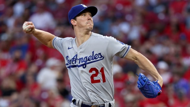 CINCINNATI, OHIO - SEPTEMBER 17: Walker Buehler #21 of the Los Angeles Dodgers pitches in the first inning.