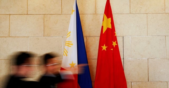 National flags are placed outside a room in Beijing, China, January 23, 2017. REUTERS/Damir Sagolj/File Photo