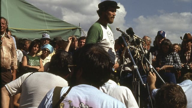 In this 1979 photograph, Jim Williams speaks during a protest against the damming of the Little Tennessee River, home or the Snail Darter, in Tenn. The fish was at the center of a battle between developers of the Tellico Dam and conservationists. (Courtesy of C. Kenneth Dodd Jr. via AP)