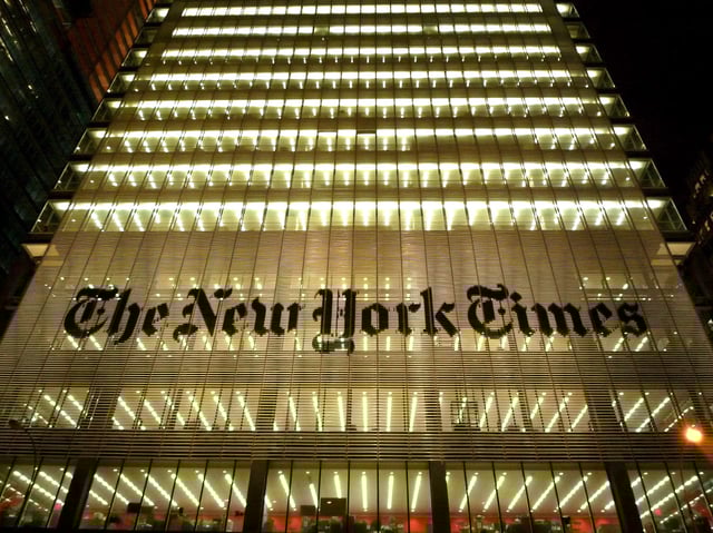 The New York Times building in Manhattan. The newspaper accused OpenAI and Microsoft of “unlawful copying and use of The Times’s uniquely valuable works.” (GeekWire File Photo / Kurt Schlosser)