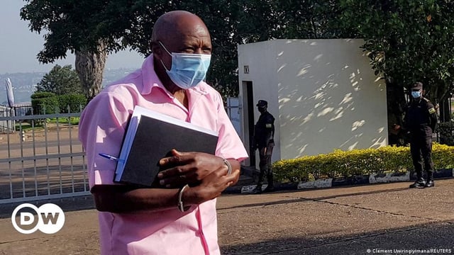 Paul Rusesabagina walks in handcuffs to a courtroom in Kigali, Rwanda February 26, 2021.