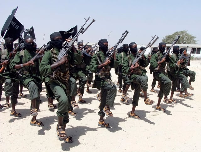Newly trained Al-Shabaab fighters perform military exercises south of Mogadishu, Somalia, in 2011.