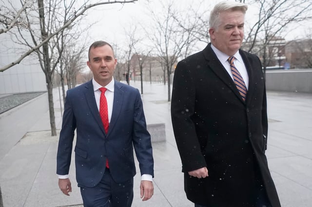 Former Delta Air Lines pilot Jonathan J. Dunn (left) walks with his attorney following his first federal court appearance Thursday, Jan. 4, 2024, in Salt Lake City. Dunn, who was the first officer, or co-pilot, threatened to shoot the captain during a heated argument in the cockpit over whether to change course to accommodate a passenger's medical issue.