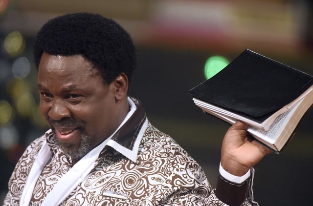 Nigerian pastor TB Joshua speaks during a New Year's memorial service for the South African relatives of those killed in a building collapse at his Lagos megachurch on December 31, 2014.