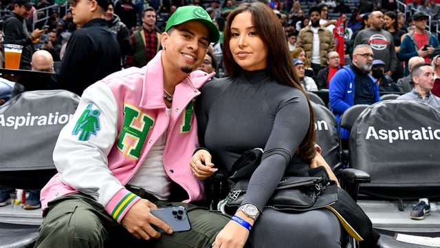 Austin McBroom and Catherine Paiz attend a basketball game between the Los Angeles Clippers and the Boston Celtics at Crypto.com Arena on December 12, 2022 in Los Angeles, California.