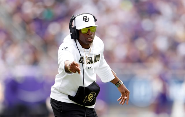 Head coach Deion Sanders of the Colorado Buffaloes celebrates a touchdown against the TCU Horned Frogs during the first half at Amon G. Carter Stadium on September 2, 2023 in Fort Worth, Texas.