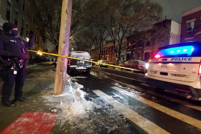 Police respond to a shooting Brooklyn on Tuesday.