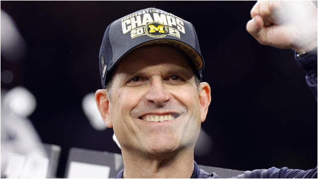 Jim Harbaugh reportedly doesn't want Michigan's athletic director to have the power to fire him "for cause." He wants a panel to decide. (Credit: Getty Images)