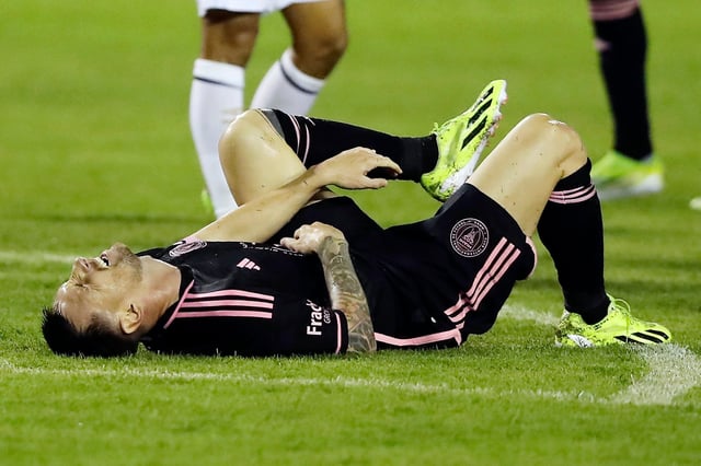 Lionel Messi takes a breather during Inter Miami’s friendly match between away to El Salvador. Photo: EPA-EFE