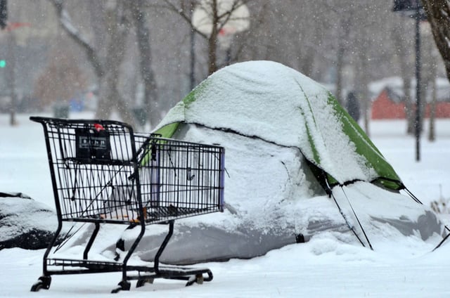 Tents in the snow at homeless encampment in Chicago
