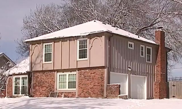 The house where three men were found dead.