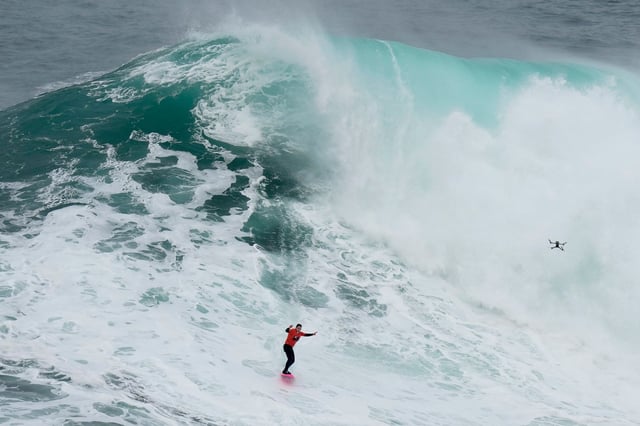 Maya Gabeira rides a wave during the Nazare Big Wave Challenge on Monday.