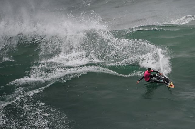 Brazilian surfer Lucas Chianca rides a wave during the World Surf League Nazare Big Wave Challenge at Praia do Norte in Nazare, on January 22, 2024. (Photo by MIGUEL RIOPA / AFP) (Photo by MIGUEL RIOPA/AFP via Getty Images)