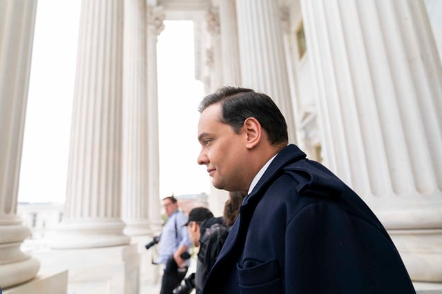 FILE - Rep. George Santos, R-N.Y., leaves the Capitol after being expelled from the House of Representatives, Friday, Dec. 1, 2023, in Washington.