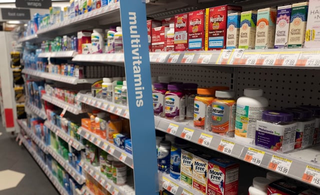 Vitamins are displayed in pharmacy Duane Reade by Walgreens, Thursday, March 25, 2021, in New York. Walgreens reports earnings March 31, 2021.