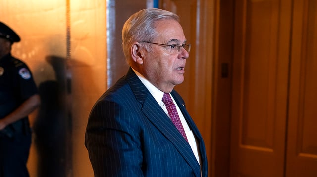 Sen. Robert Menendez (D-N.J.) leaves the Senate Chamber following the last votes of the week on Thursday, November 2, 2023