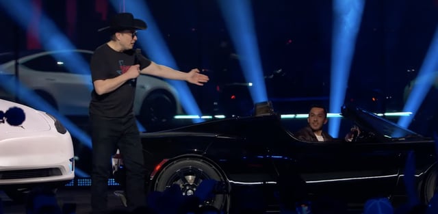 Omead Afshar with Elon Musk at Tesla Cyber Rodeo