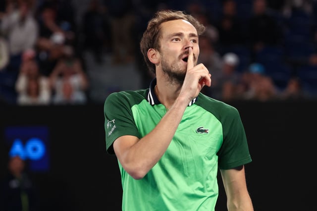 Medvedev celebrates reaching his third Australian Open final against Zverev.