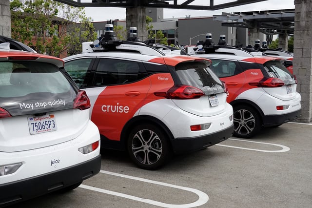 Cruise autonomous vehicles sit parked in a lot on June 8, 2023, in San Francisco. The company, since the October day when one of its cars dragged an SF pedestrian 20 feet, has laid off hundreds and revamped its leadership.