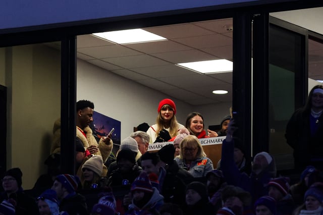 ORCHARD PARK, NY - JANUARY 21: Singer Taylor Swift looks on from a suite during an NFL divisional round playoff football game between the Kansas City Chiefs and the Buffalo Bills at Highmark Stadium on January 21, 2024 in Orchard Park, New York. (Photo by Perry Knotts/Getty Images)