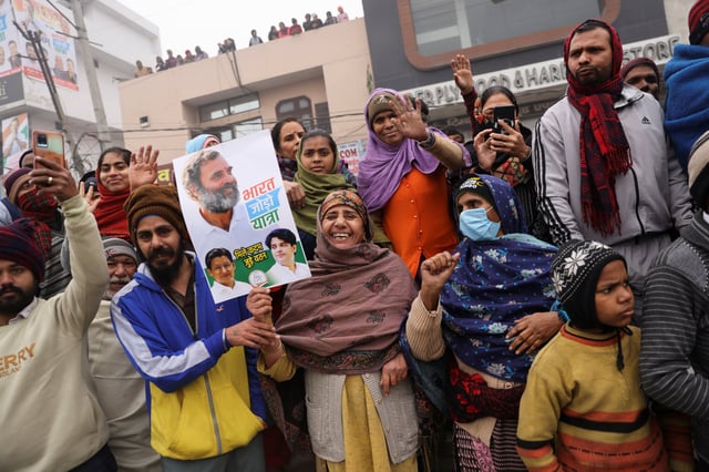 People gather to catch a glimpse of Congress party leader Rahul Gandhi during his cross-country march in Panipat, India, on January 6, 2023. Photo: Reuters
