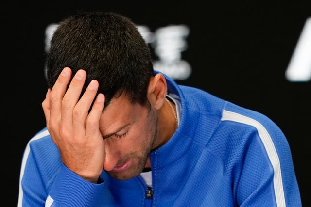 Novak Djokovic of Serbia reacts during a press conference following his loss to Jannik Sinner of Italy in their semifinal at the Australian Open tennis championships at Melbourne Park, Melbourne, Australia, Friday, Jan. 26, 2024. (AP Photo/Louise Delmotte)