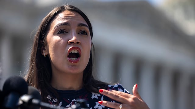 Rep. Alexandria Ocasio-Cortez (D-N.Y.) speaks during a press conference on psychedelics with Rep. Dan Crenshaw (R-Texas) and Rep. Lou Correa (D-Cali.) outside the Capitol on Thursday, July 13, 2023.