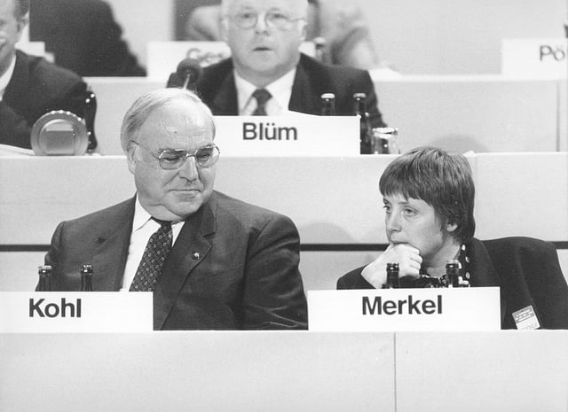 German Federal Chancellor Helmut Kohl and Angela Merkel attend the convention of the German party, CDU, on Dec. 15, 1991 in Dresden, Germany.  