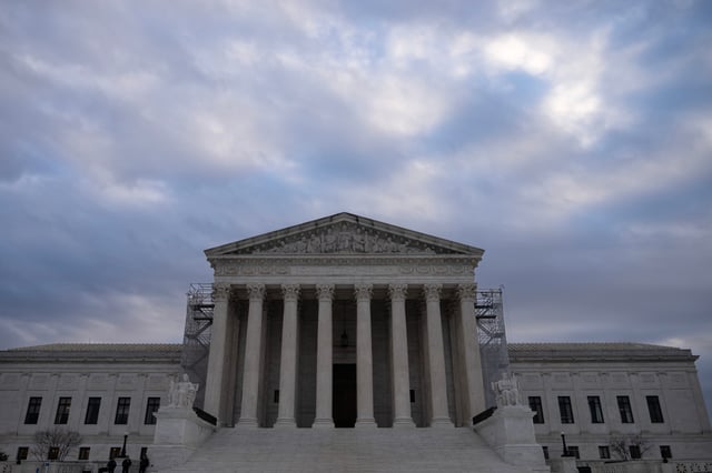 WASHINGTON, DC - JANUARY 4: A view of the U.S. Supreme Court on Thursday morning January 4, 2024 in Washington, DC. Former President Donald Trump has petitioned the U.S. Supreme Court to keep his name on the primary ballot in Colorado. Earlier in December, the Colorado Supreme Court ruled 4-3 that former President Donald Trump is ineligible to run for the White House and appear on the state's ballot, citing the U.S. Constitution's insurrection clause in the 14th amendment. (Photo by Drew Angerer/Getty Images)