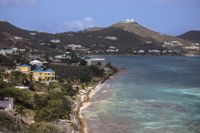 Cane Bay beach in Saint Croix, Virgin Islands, U.S., on Sunday, March 28, 2021. Across the Caribbean, the impact of COVID-19 on the travel and tourism industry has been very apparent, the Caribbean Tourism Organization (CTO) said in a report. 2020 saw a 65.5 percent drop in tourist arrivals to the Caribbean. Photographer: Ivan Valencia/Bloomberg via Getty Images
