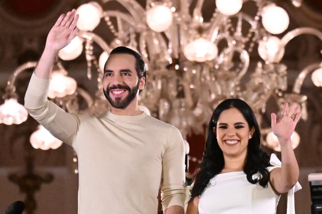 El Salvadoran President Nayib Bukele greets supporters next to his wife Gabriela Rodriguez after the presidential and legislative elections in San Salvador on Feb. 4, 2024. 