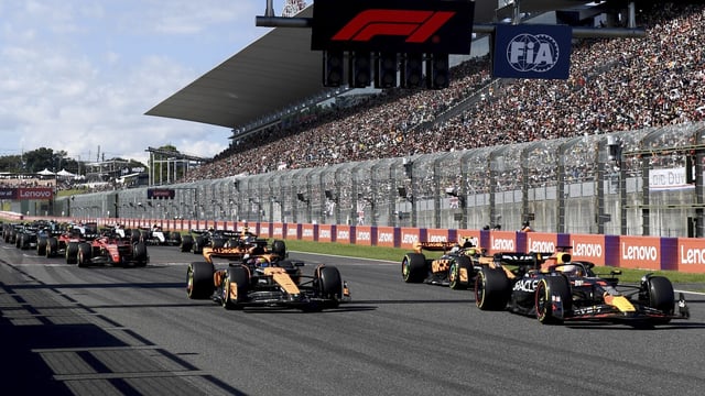FILE - Red Bull driver Max Verstappen of the Netherlands, right, leads the field after the start of the Japanese Formula One Grand Prix at the Suzuka Circuit, Suzuka, central Japan, Sunday, Sept. 24, 2023. The Japanese Grand Prix will stay on the Formula One calendar until at least 2029 after a five-year contract extension to keep the race at the Suzuka Circuit. The extension announced Friday, Feb, 2, 2024 is a sign of confidence in the Japanese GP ahead of a move from its usual September or October date to April, between the races in Australia and China. (Toshifumi Kitamura/Pool via AP, File)