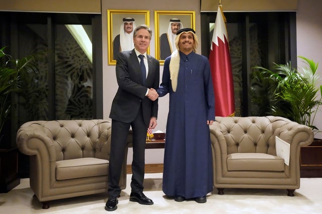 U.S. Secretary of State Antony Blinken shakes hands with Qatar's Prime Minister and Foreign Affairs Minister Mohammed Bin Abdulrahman Al Thani, at Diwan Annex, in Doha, Qatar, Tuesday, Feb. 6, 2024.     Mark Schiefelbein/Pool via REUTERS