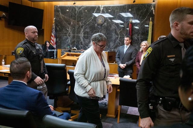 PONTIAC, MICHIGAN - FEBRUARY 6: Jennifer Crumbley, the mother of Oxford, Michigan high school shooter Ethan Crumbley, exits from the courtroom in Oakland County Circuit Court after the jury found her guilty on four counts of involuntary manslaughter on February 6, 2024 in Pontiac, Michigan. This is the first time in U.S. history that a parent has been convicted of involuntary manslaughter for a mass school shooting committed by their child. Her husband, James Crumbley, goes on trial in March for the same charges. (Photo by Bill Pugliano/Getty Images)
