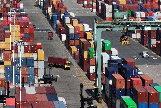 In an aerial view, shipping containers are seen stacked at the Port of Oakland on August 07, 2023 in Oakland, California. According to the report by the Census Bureau, U.S. imports from China fell 24 percent during the first five months of 2023 compared to the same period one year ago.