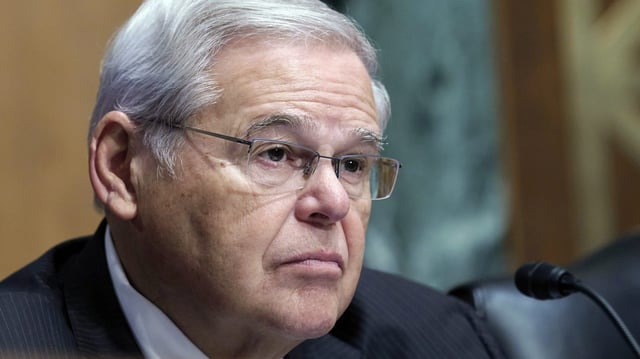 FILE – Sen. Bob Menendez, D-N.J., listens during a Senate Banking, Housing, and Urban Affairs hearing at the Capitol in Washington, Tuesday, Sept. 20, 2022. Menendez, a New Jersey Democrat who avoided conviction on corruption charges five years ago, is reportedly the subject of a new federal investigation. An adviser for the senator, Michael Soliman, acknowledged the probe in a statement Wednesday, Oct. 26, 2022. (AP Photo/Mariam Zuhaib, File)
