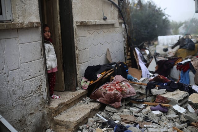 A girl stands near the rubble after an Israeli airstrike in the southern Gaza Strip city of Rafah. Photo: Xinhua