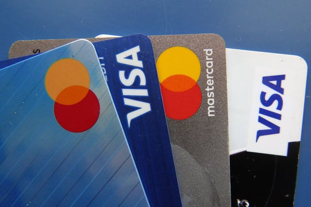 Credit cards. AP Photo/John Raoux, File