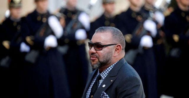 Morocco's King Mohammed VI arrives for a lunch at the Elysee Palace as part of the One Planet Summit in Paris, France, December 12, 2017.  REUTERS/Philippe Wojazer/File Photo