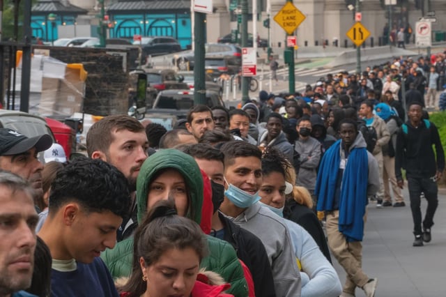 Hundreds of asylum-seekers lined up outside of the Jacob K. Javits Federal Building on June 6, 2023, in New York City, looking to conduct immigration business.
