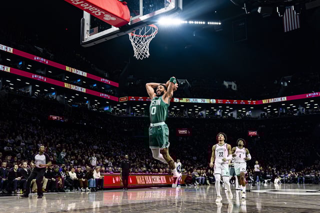 Celtics star Jayson Tatum rises for two of his 41 points Tuesday as Boston won its eighth straight game in Downtown Brooklyn. AP Photo by Peter K. Afriyie
