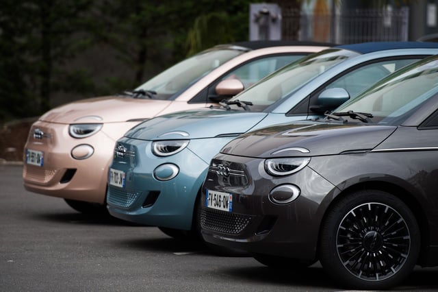 Fiat 500e electric automobiles outside a Fiat showroom, operated by Stellantis NV, in Paris, France, on Monday, Aug. 2, 2021.