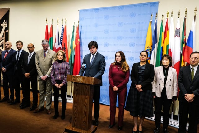 UN Security Council President and Ecuador's Permanent Representative, Jose de la Gasca (C), flanked by other UN ambassadors, speaks to the press prior to a security council meeting about the situation in Afghanistan at UN headquarters in New York City on December 20, 2023. (Photo by Charly TRIBALLEAU / AFP) (Photo by CHARLY TRIBALLEAU/AFP via Getty Images)