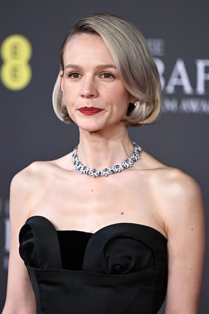 Carey Mulligan looked elegant in strapless Dior.