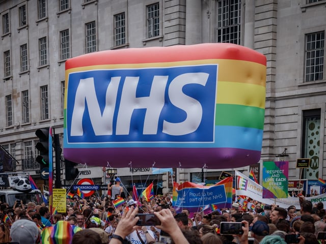 PICCADILLY CIRCUS, LONDON, ENGLAND, UNITED KINGDOM - 2019/07/06: NHS seen during the parade. The Pride in London 2019 Parade Day is a London-based event held by Pride in London. It is a parade of people of all genders, sexualities, races, nationalities, backgrounds and faiths coming together for the UKs biggest Pride celebration. Central London was covered in rainbow-themed decorations, signifying inclusiveness. (Photo by Belinda Jilao/SOPA Images/LightRocket via Getty Images)