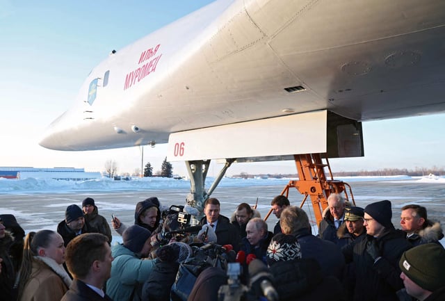 Russia’s President Vladimir Putin meets journalists after flying in a Tupolev Tu-160M strategic bomber in Kazan on Thursday. Photo: AFP