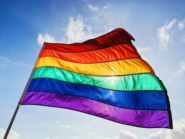 Rainbow LGBTQ pride flag waving in the wind. (Getty)