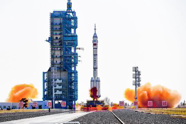 A Long March-2F carrier rocket carrying three astronauts heading to China's orbital space station lifts off from the Jiuquan Satellite Launch Center in Inner Mongolia on October 26, 2023.